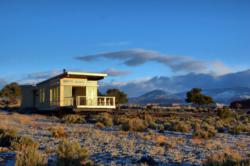 Stillwater's red rock Utah prefabricated home at sunrise